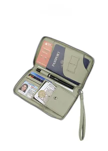 Internal layout of bean green litchi texture passport wallet showing storage capacity