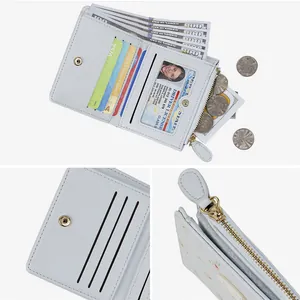 Petit portefeuille bleu clair à fleurs pour femme avec fentes pour cartes et zip