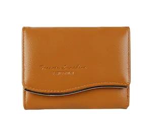 Detail of brown vintage PU leather wallet featuring S-curve flap and gold metal trim