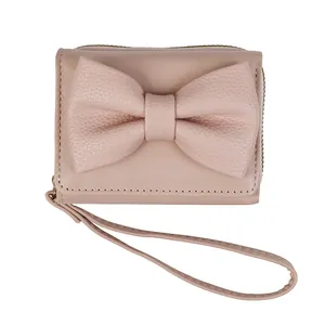 Pink PU leather short bow wallet for women with wristlet strap and pebble texture