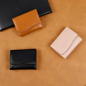 Three minimalist short PU leather wallets with wave metal trim and embossed text