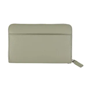 Sage green accordion wallet with pebbled leather texture and secure zipper closure