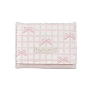 Pink checkered trifold wallet for women featuring a bow design and Cute Girl label