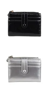 Detail of vintage cracked leather wallets with card slots and zipper pocket