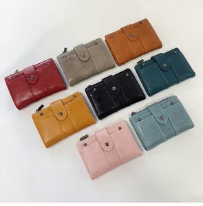 Portefeuilles courts en cuir PU disponibles en plusieurs couleurs avec bouton et zip