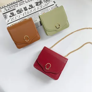 Mini-Umhängetasche Set in Braun Grün und Rot aus Leder mit goldener Metallschnalle
