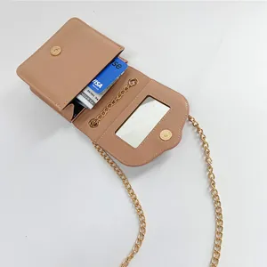 Minimalistische aprikosenfarbene PU-Leder-Minitasche mit Kette und integriertem Spiegel