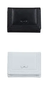 Close-up of trifold bow wallets in light blue and black with fine stitching details