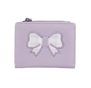 Close-up of light purple PU leather wallet featuring a plaid bow and metal zipper detail