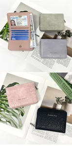 Detail view of colorful compact leather wallets featuring multiple card slots and ID window