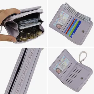 Lavender purple zip wallet with multiple card slots and coin pocket in pebble faux leather