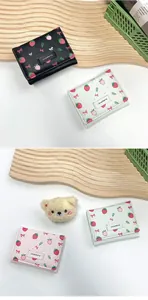 Portefeuille femme à trois volets avec motif fraise et nœud en cuir synthétique chic