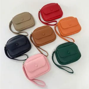 Litchi pattern leather wristlet purses in multiple colors with snap pocket and zipper