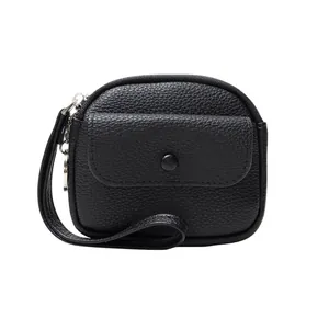 Minimalist black pebbled leather wristlet wallet for women with zipper and wrist strap