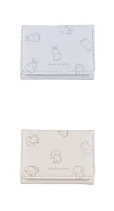 Close-up of animal pattern folding wallets with detailed stitching and soft PU leather texture