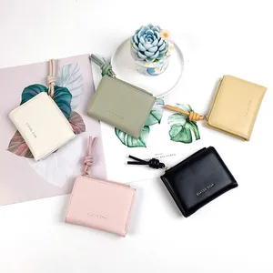 Minimalist short women's zip wallet with knot pendant in five assorted soft colors