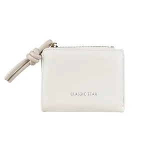 Minimalist beige leather zip wallet with stylish knot pull and Classic Star logo