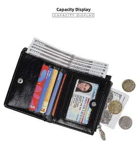 Detailed interior of minimalist black leather wallet showing card slots and currency section