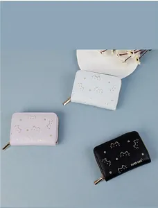 Short PU leather cat wallet display in light blue, lilac, and black with zip closure