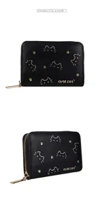 Detail of the black PU leather wallet showing cute golden cat prints and a sturdy zipper closure