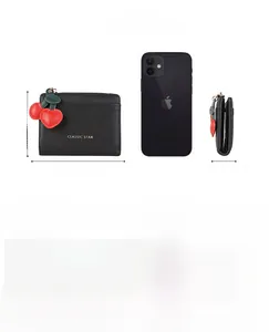 Dimensions du portefeuille zippé en L 11,5x9x2,5cm comparées à la taille d'un mobile
