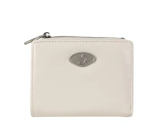 Close-up of white wrinkled leather wallet featuring an oval silver S metal plaque