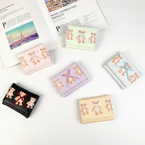 Cute teddy bear tri-fold wallets for women in six pastel colors with bow decoration