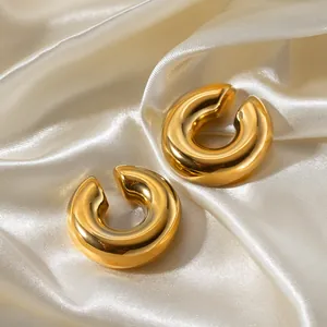 Minimalist 18k gold plated stainless steel C-shaped chunky hoop earrings on silk