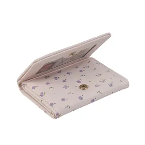 Petit portefeuille rose à motif floral violet avec fenêtre d'identité transparente