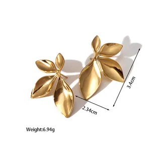 Detailed view of 18k gold plated leaf earrings with size and weight measurements