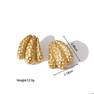 Macro view of 18k gold plated hammered shell earrings with size and weight details