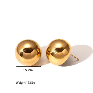 Detail shot showing 1.93cm diameter and 17.86g weight of gold polished sphere earrings