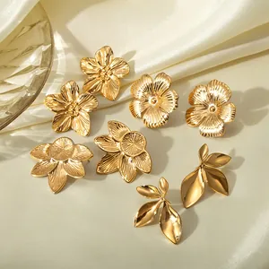 Elegant 18k gold plated stainless steel floral and leaf stud earring set on silk