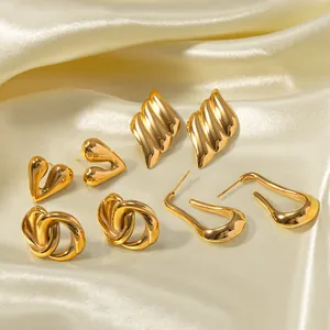 Set of four 18k gold plated stainless steel earrings with heart and leaf designs
