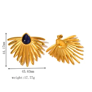 Detailed view of 18k gold earrings with blue gemstone and dimension measurements
