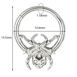 Macro view of stainless steel punk spider septum ring with skull detail and size specs