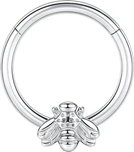 Macro detail of a 316L stainless steel bee nose ring with pavé-set clear zircon stones