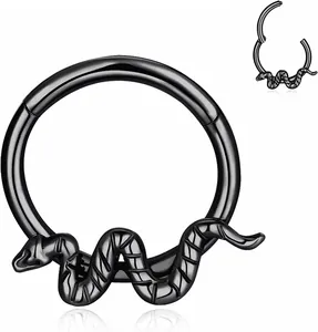 Detail of black hinged segment ring with intricate snake motif in punk style steel