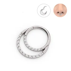 Close-up of silver double-layered septum nose ring with sparkling pavé cubic zirconia