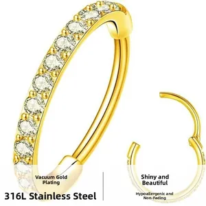 Detailed view of gold hinged 316L stainless steel nose ring with sparkling zircon stones