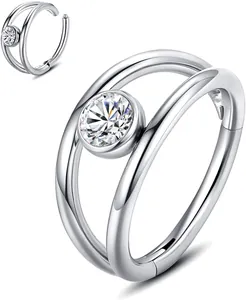 Detail of 316L stainless steel double hoop nose ring with brilliant-cut cubic zirconia