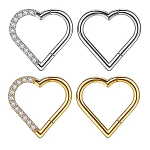 Polished 316L stainless steel heart clicker earrings with 18K gold and silver zircon inlay