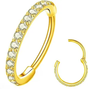 Detail view of gold hinged segment ring with paved zircons for nose or ear piercings