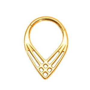 Polished gold teardrop septum ring featuring a unique geometric lattice cutout design