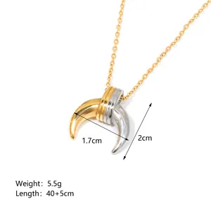 Macro shot of two-tone horn heart pendant with size and weight dimensions details