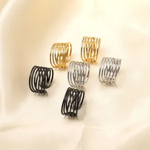Set of six adjustable stainless steel wide rings in gold, silver, and black finishes