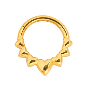Golden hinged segment hoop ring featuring seven connected heart shapes for septum or ear