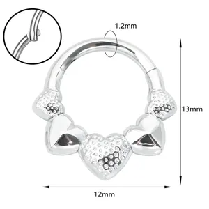 316L stainless steel heart-shaped hinged clicker piercing ring with detailed engravings
