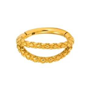 Golden double-layered hinged nose ring with braided texture and smooth steel bands
