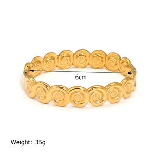 Detailed view of 18K gold plated stainless steel bracelet showing spiral texture and 6cm size